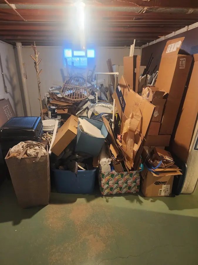 Roll-off dumpster container at job site for Yard Waste Dumpster Rental in Swanton